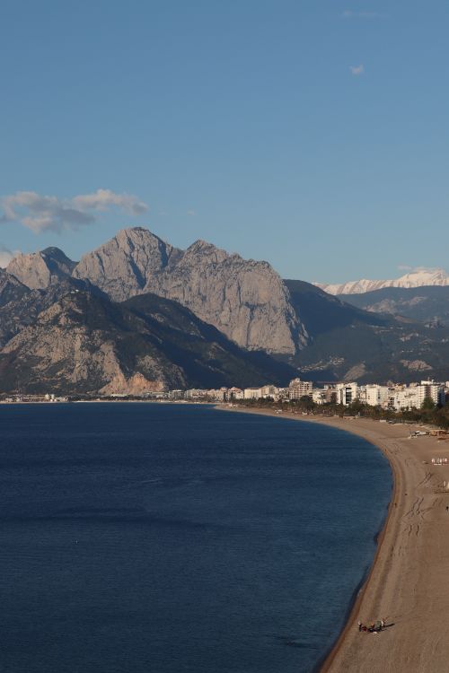 Free Beautiful coastal view of Konyaaltı Beach and Taurus Mountains in Antalya, Turkey. Stock Photo