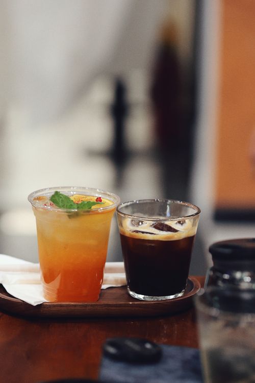 Free Two iced drinks on a wooden tray, perfect for a summer refreshment. Stock Photo