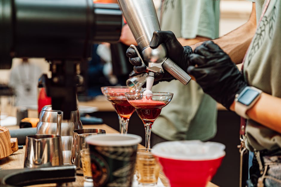 Bartender creating signature cocktails for wedding guests - Private event bartending Bartender creating signature cocktails for wedding guests - Private event bartending