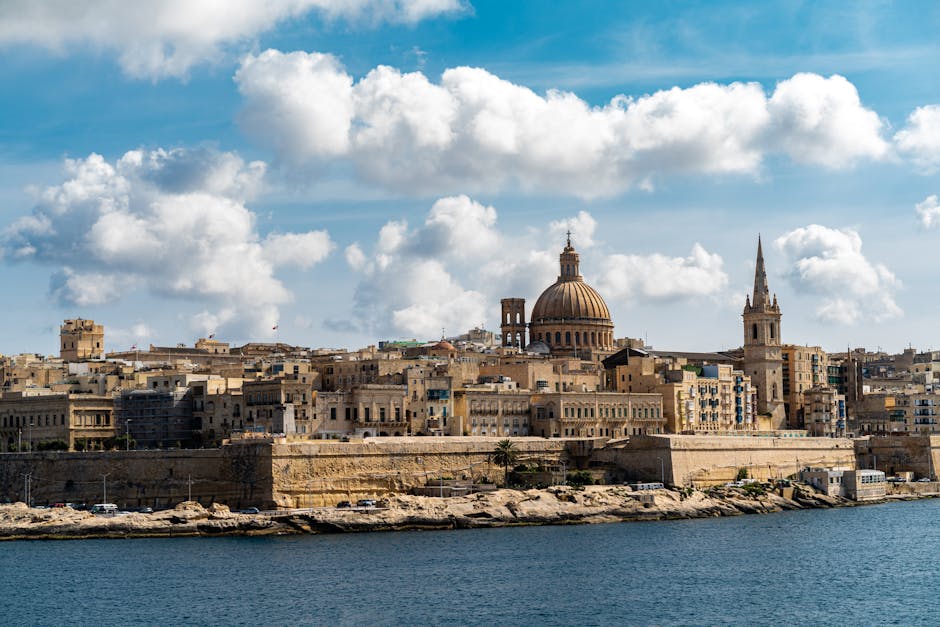 Explore Valletta, Malta's stunning skyline with its ancient architecture and iconic domes.