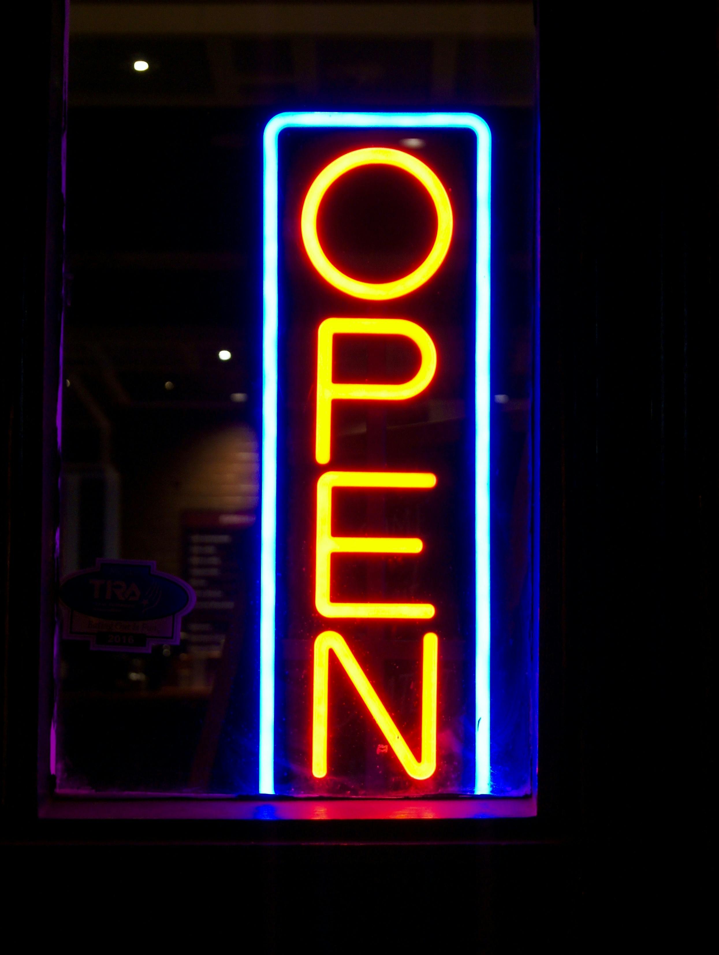 Information Sign in City at Night