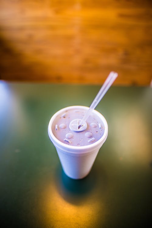 Free High Angle Photo of Disposable Plastic Cup Stock Photo