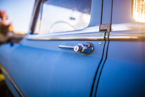 Blue Car With Chrome Door Lever
