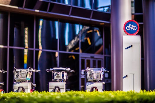 Urban bicycle parking with modern sign, featuring rows of parked bikes, reflecting vibrant city life.