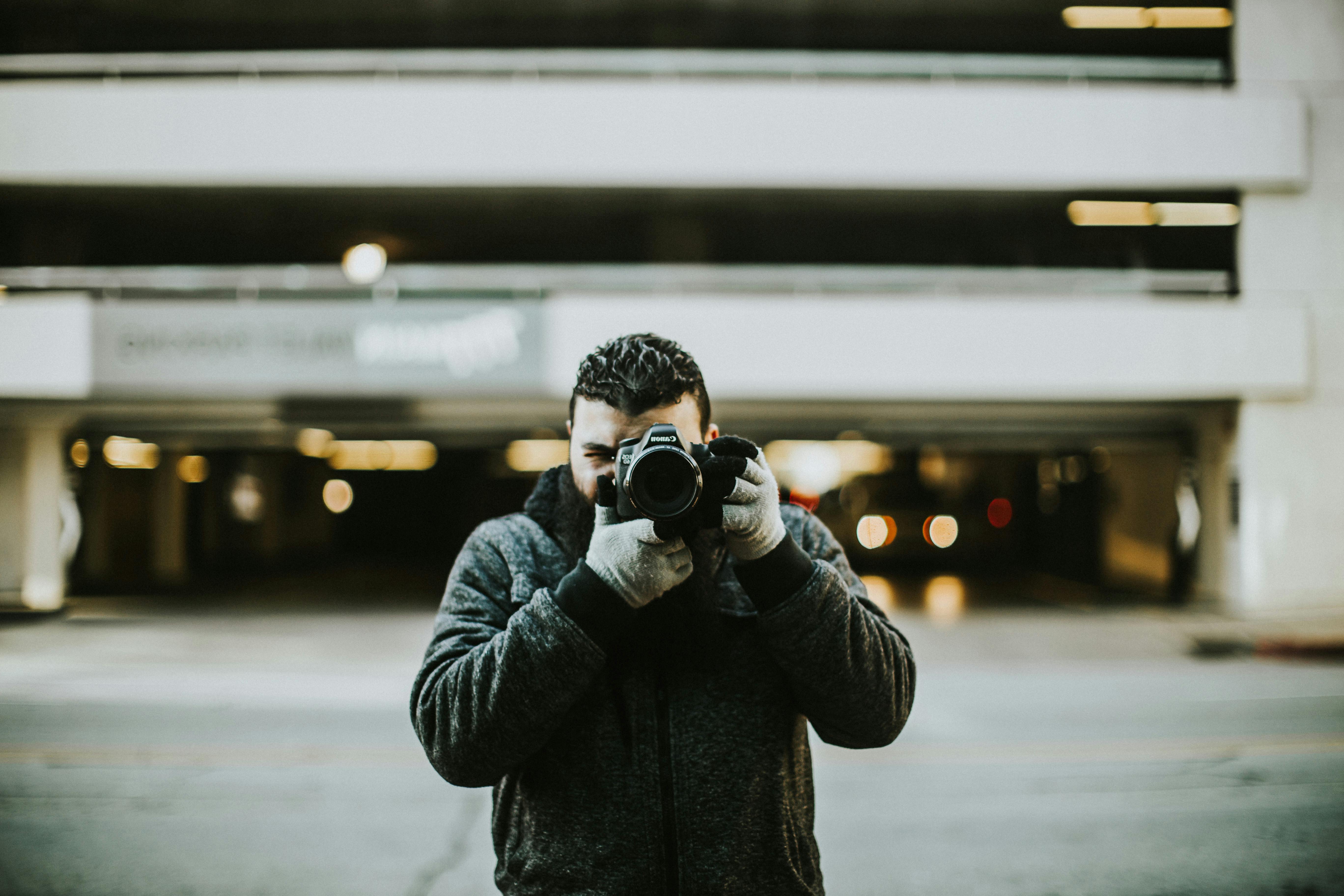 Photo Of Person Holding Camera · Free Stock Photo
