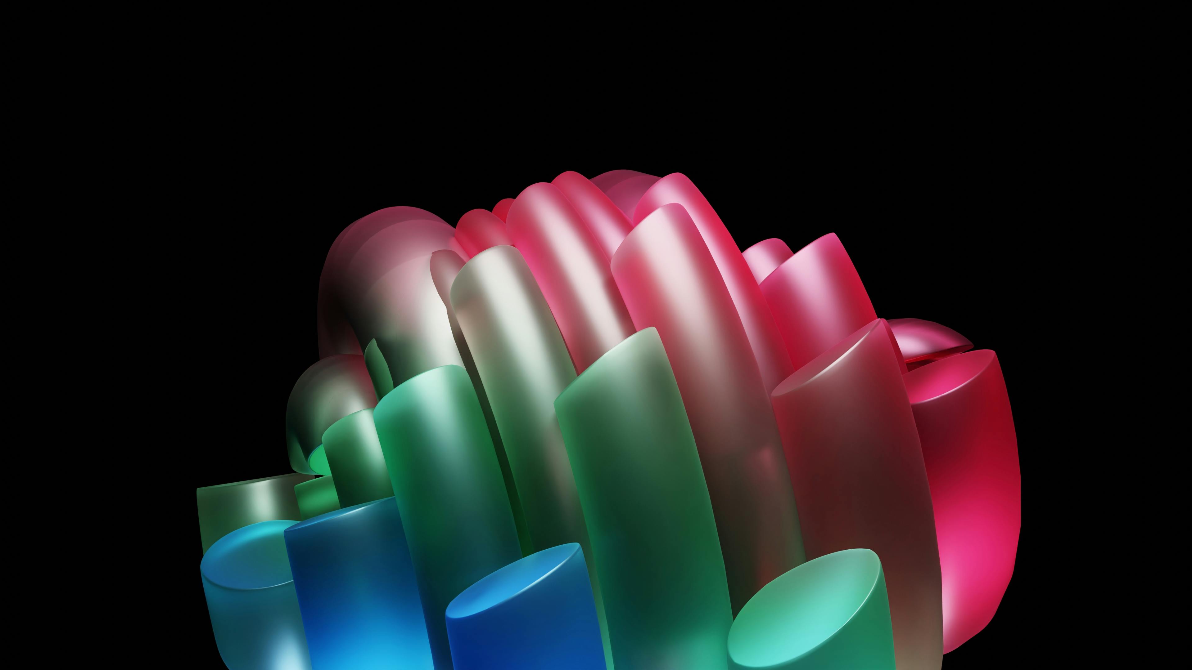 De franc Escultura abstracta vibrant amb formes corbes de colors sobre un fons negre. Foto d'estoc