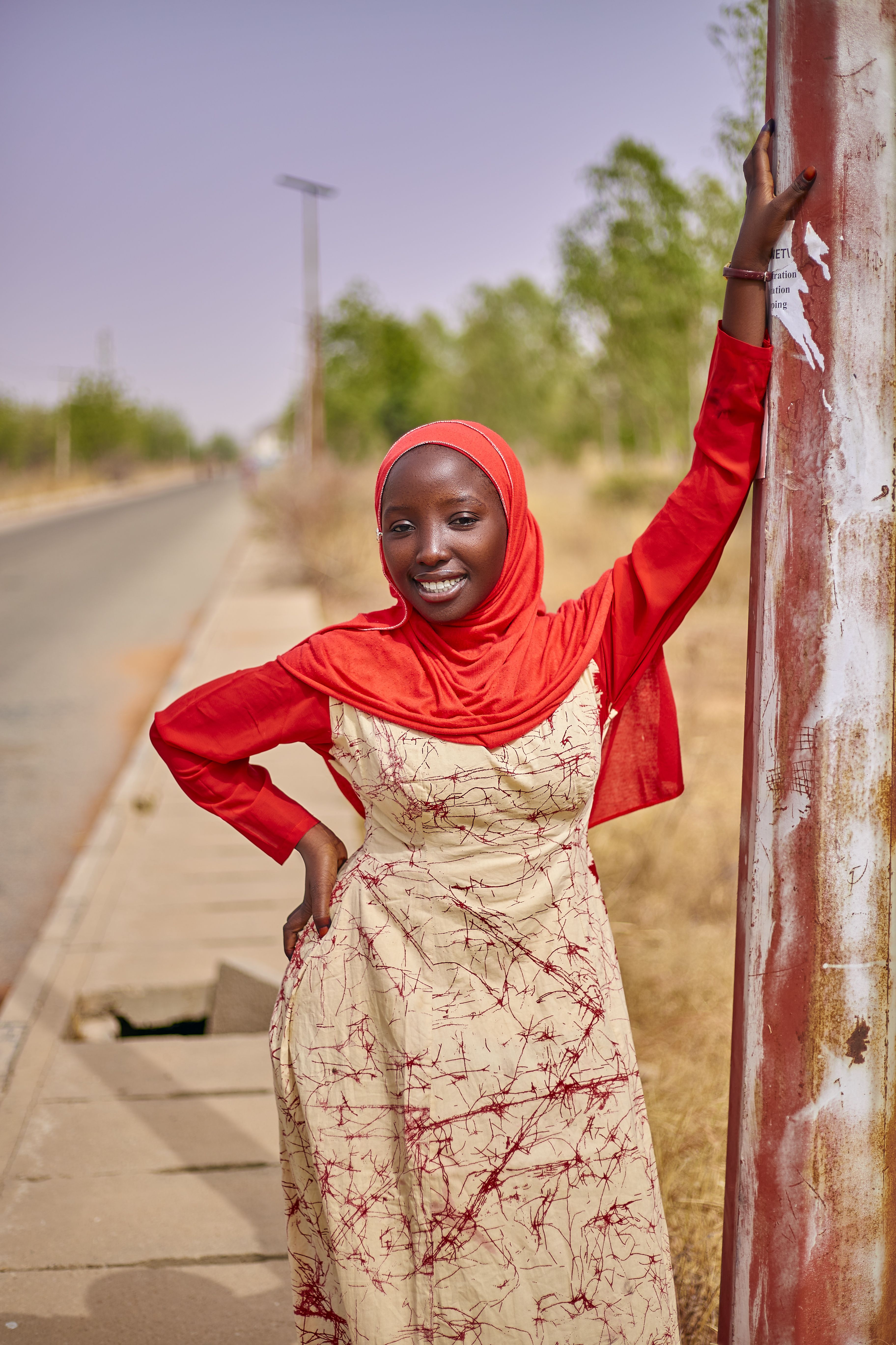 Confident Woman in Red Hijab Outdoors · Free Stock Photo