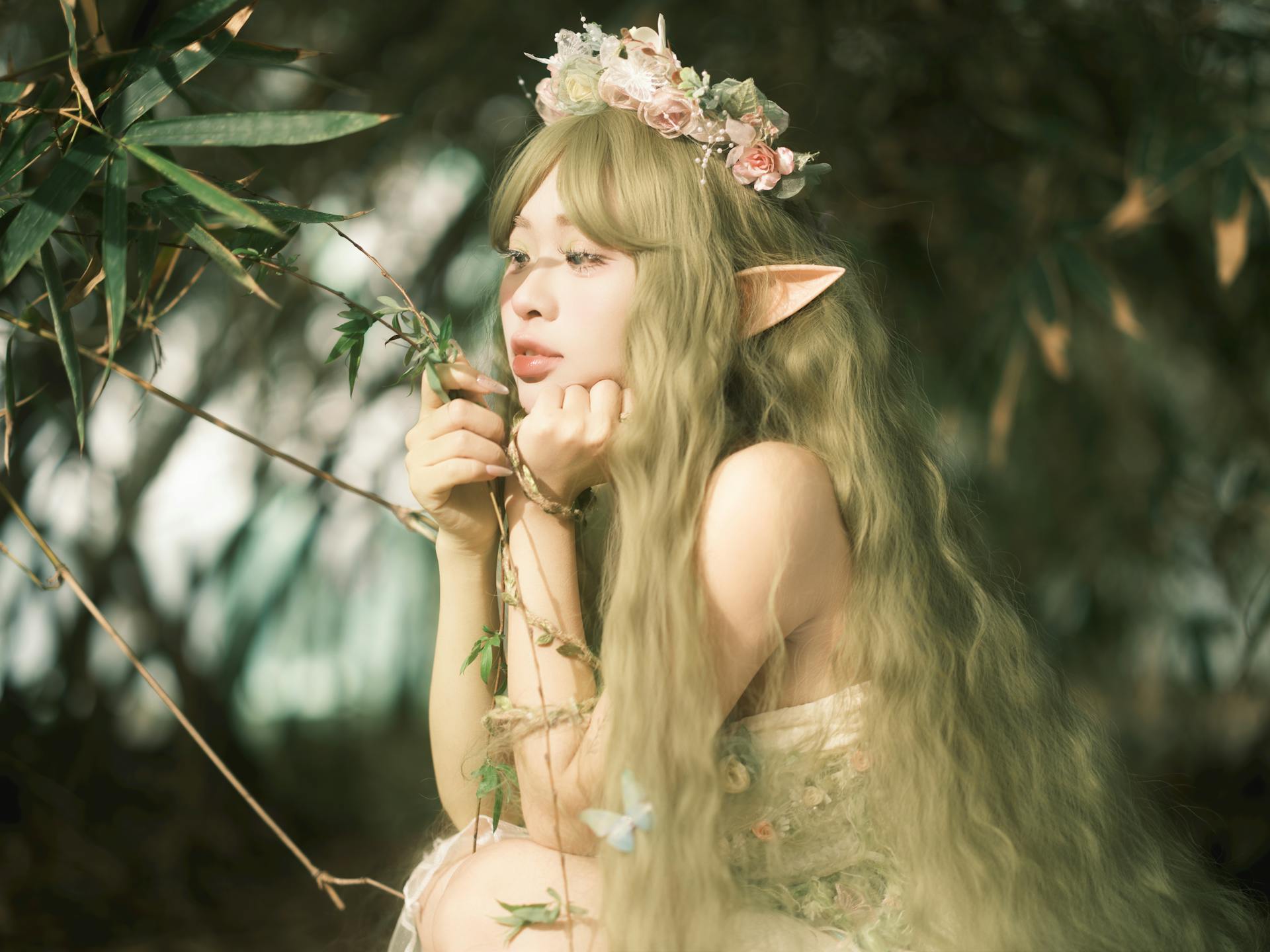 A whimsical portrait of an elf woman with a floral crown, captured in a serene outdoor setting.