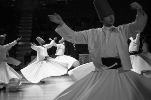Free Black and white photo of Whirling Dervishes in traditional Sufi dance from Türkiye, evoking spiritual and cultural richness. Stock Photo