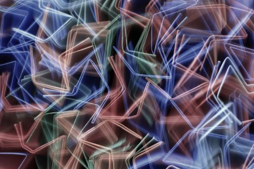 Free Vibrant abstract light painting with dynamic multicolored lines creating an energetic composition. Stock Photo