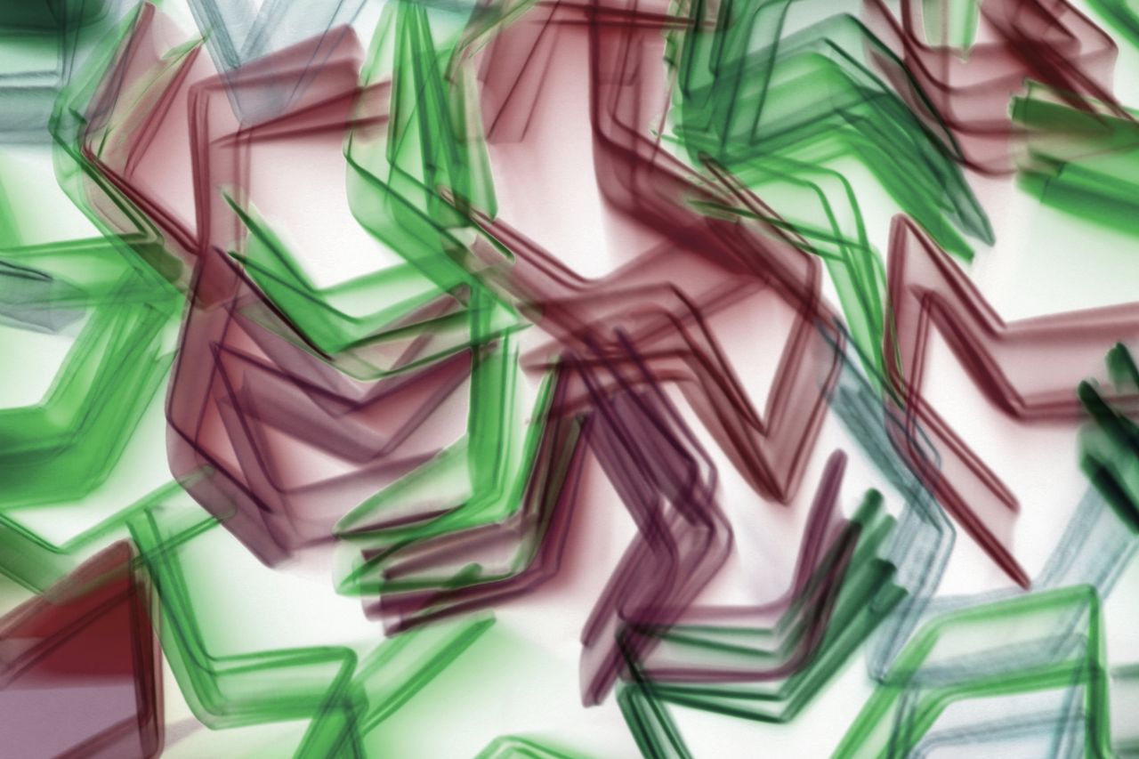 dynamic abstract image showcasing vibrant overlapping shapes in red an
