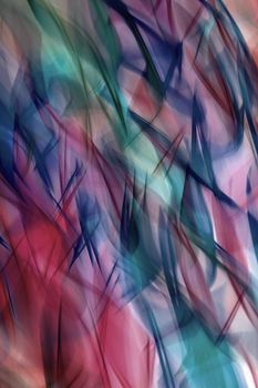 A dynamic blend of vibrant colors creating an abstract visual effect.