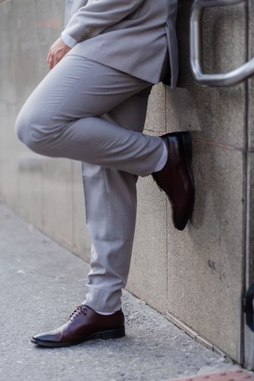 A Person in Gray Pants and Brown Leather Shoes Free Stock Photo A Person in Gray Pants and Brown Leather Shoes Free Stock Photo
