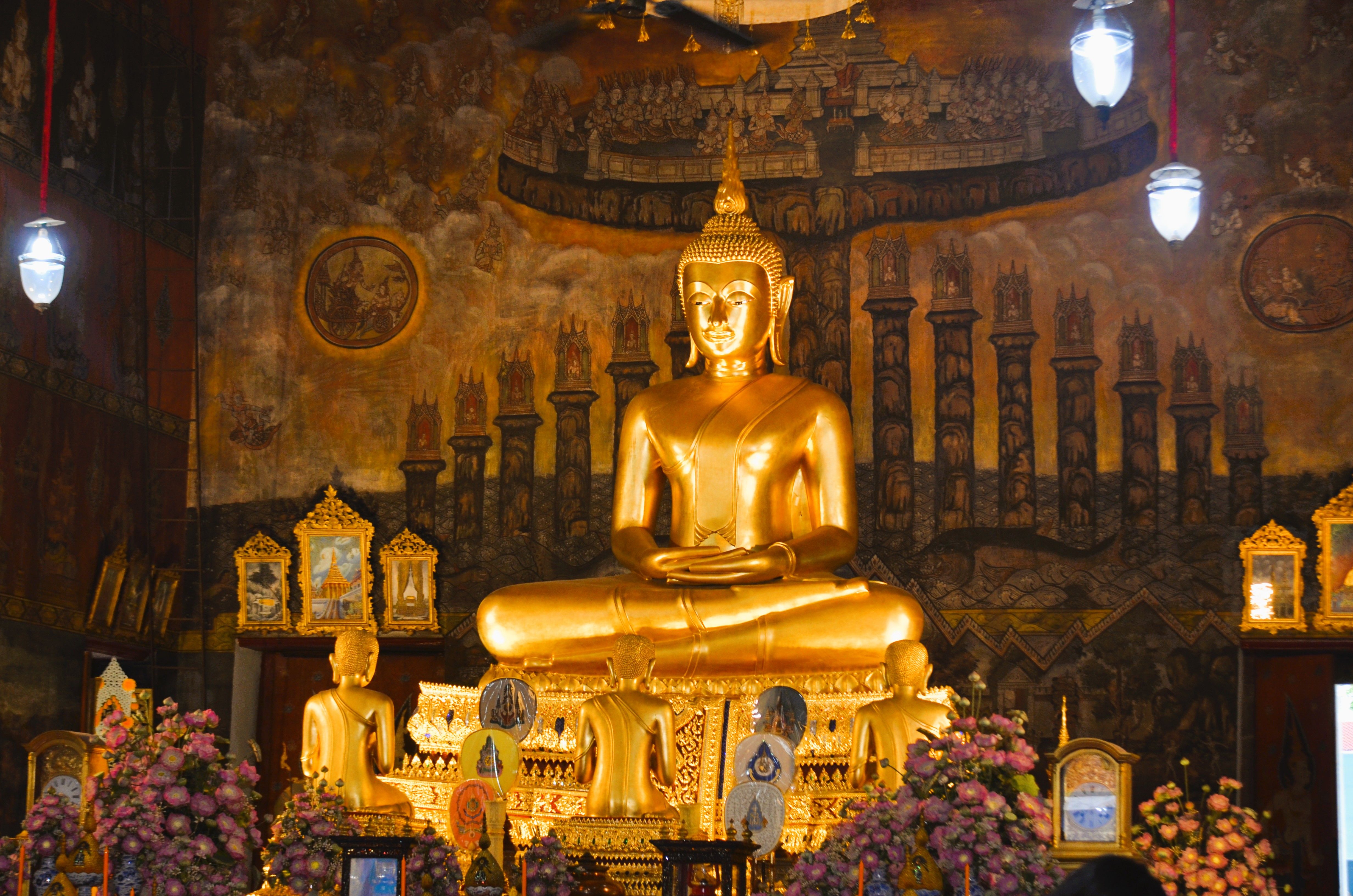 Golden Buddha statue in a Thai temple sanctuary · Free Stock Photo