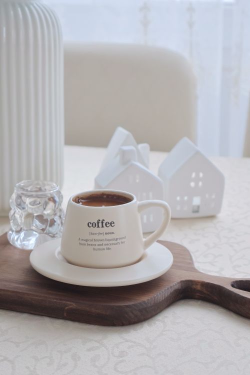 Free Elegant coffee moment with a cup on a tray and minimalist decor. Stock Photo