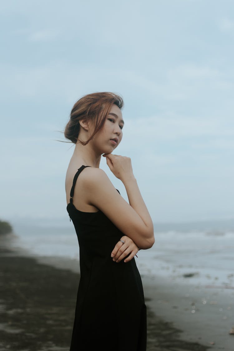 Photo Of Woman Wearing Black Dress