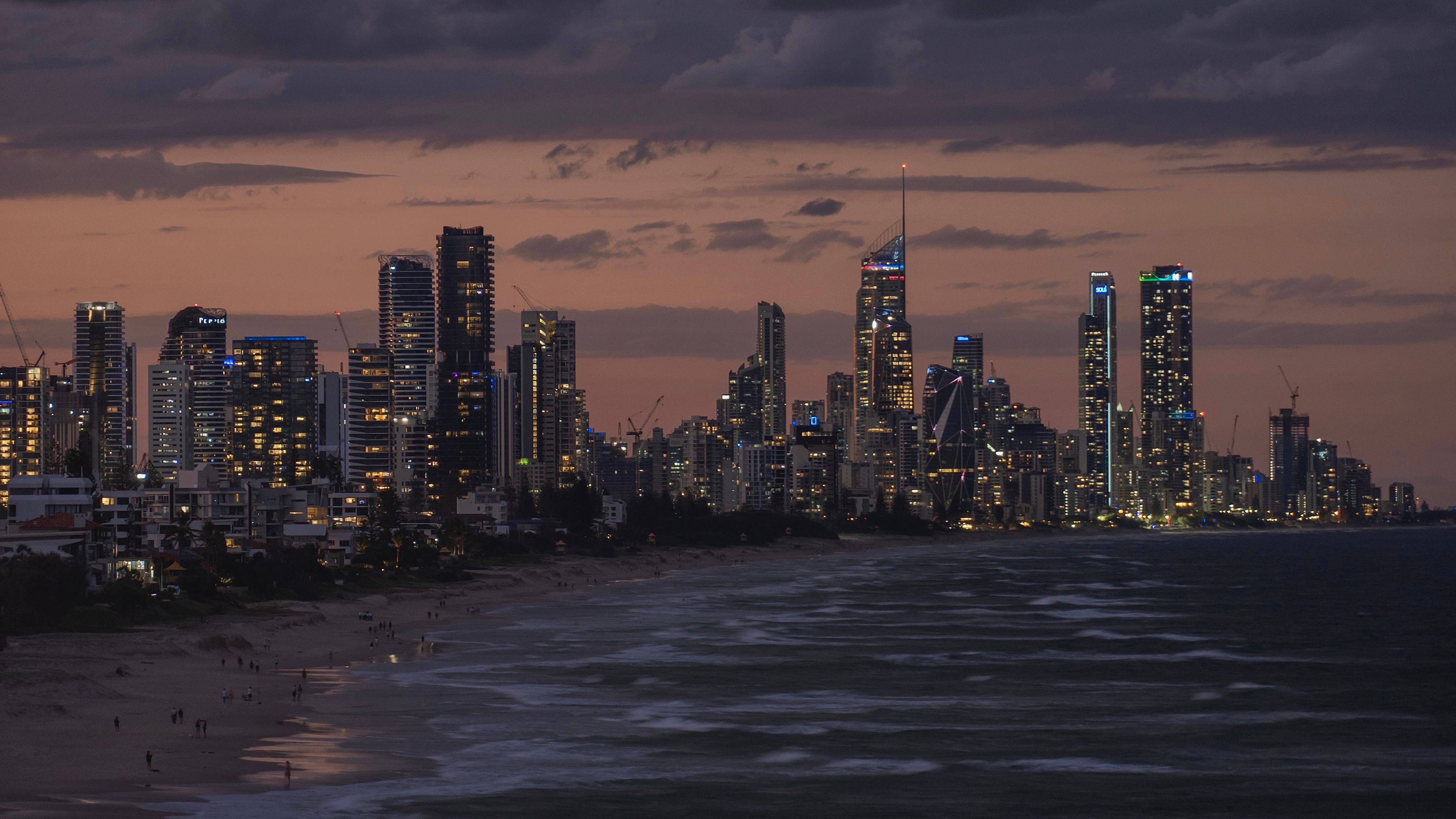 Beautiful twilight view of Gold Coast cityscape with its stunning skyline and beach.
