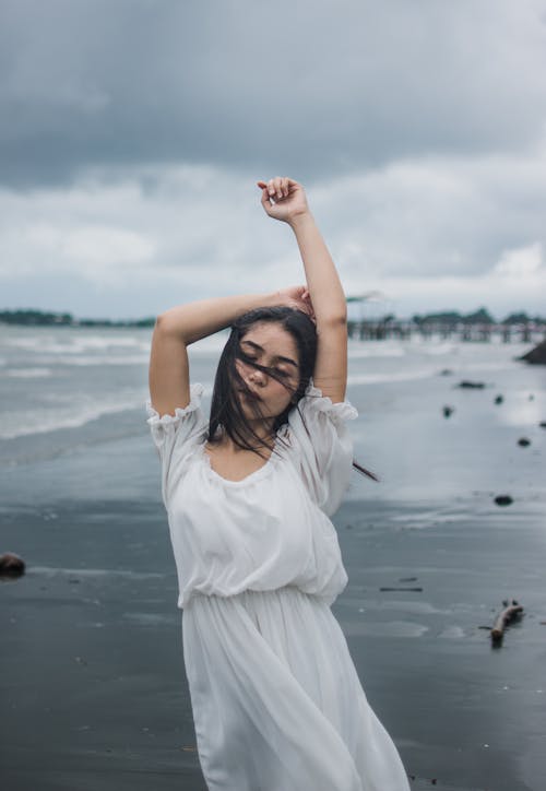 Woman On Seashore