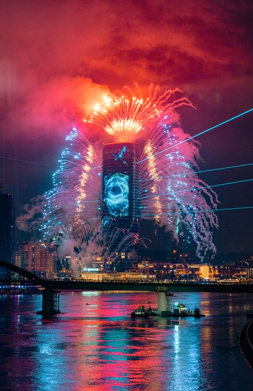 Free Stunning fireworks over Belgrade skyscraper illuminating the night sky. Perfect for festive and travel themes. Stock Photo