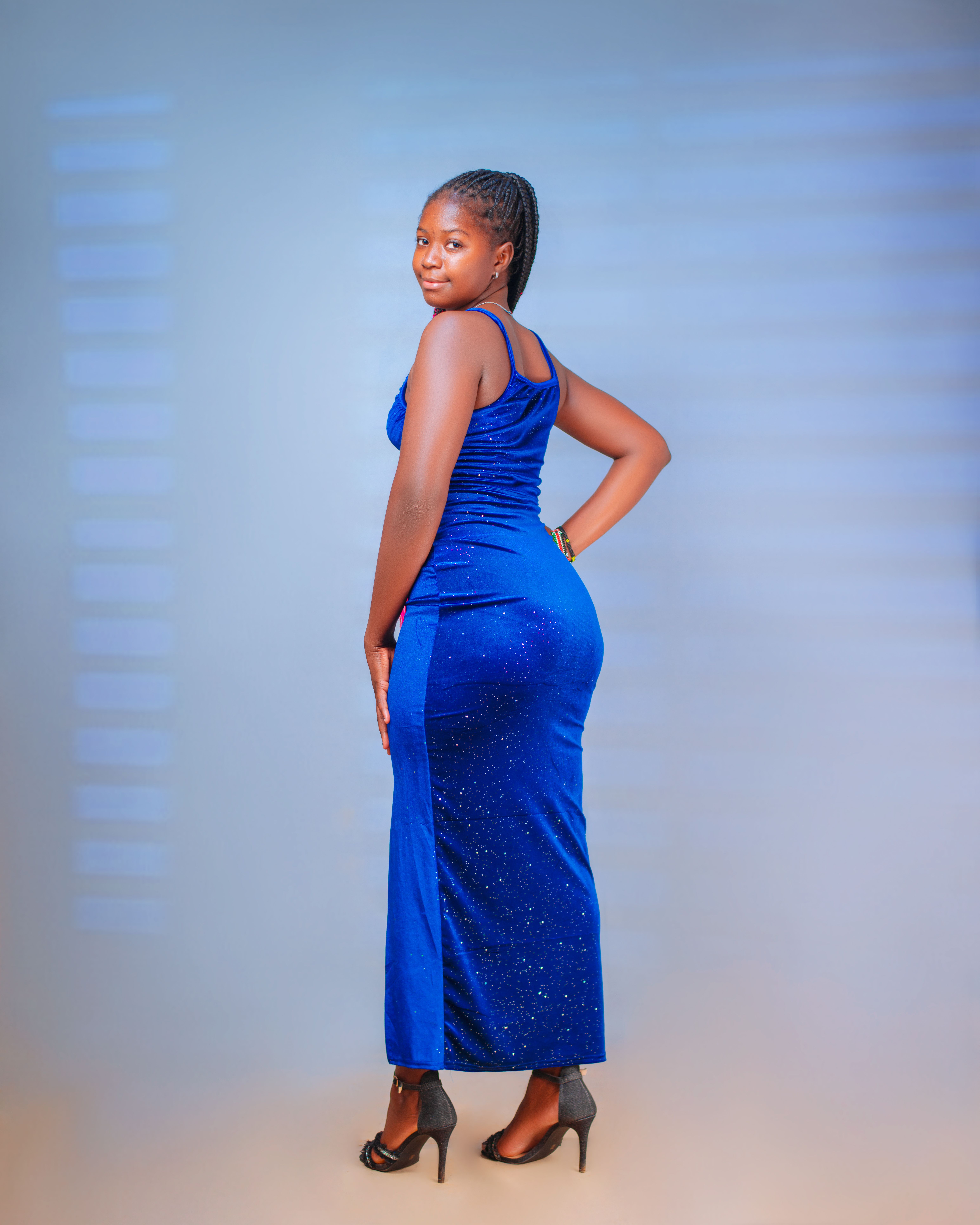 Elegant Woman in Blue Evening Gown · Free Stock Photo