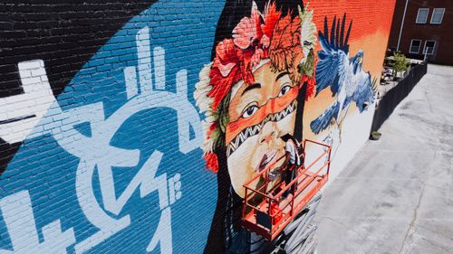 Free Colorful mural depicting cultural themes on a wall in Chattanooga, Tennessee. Stock Photo
