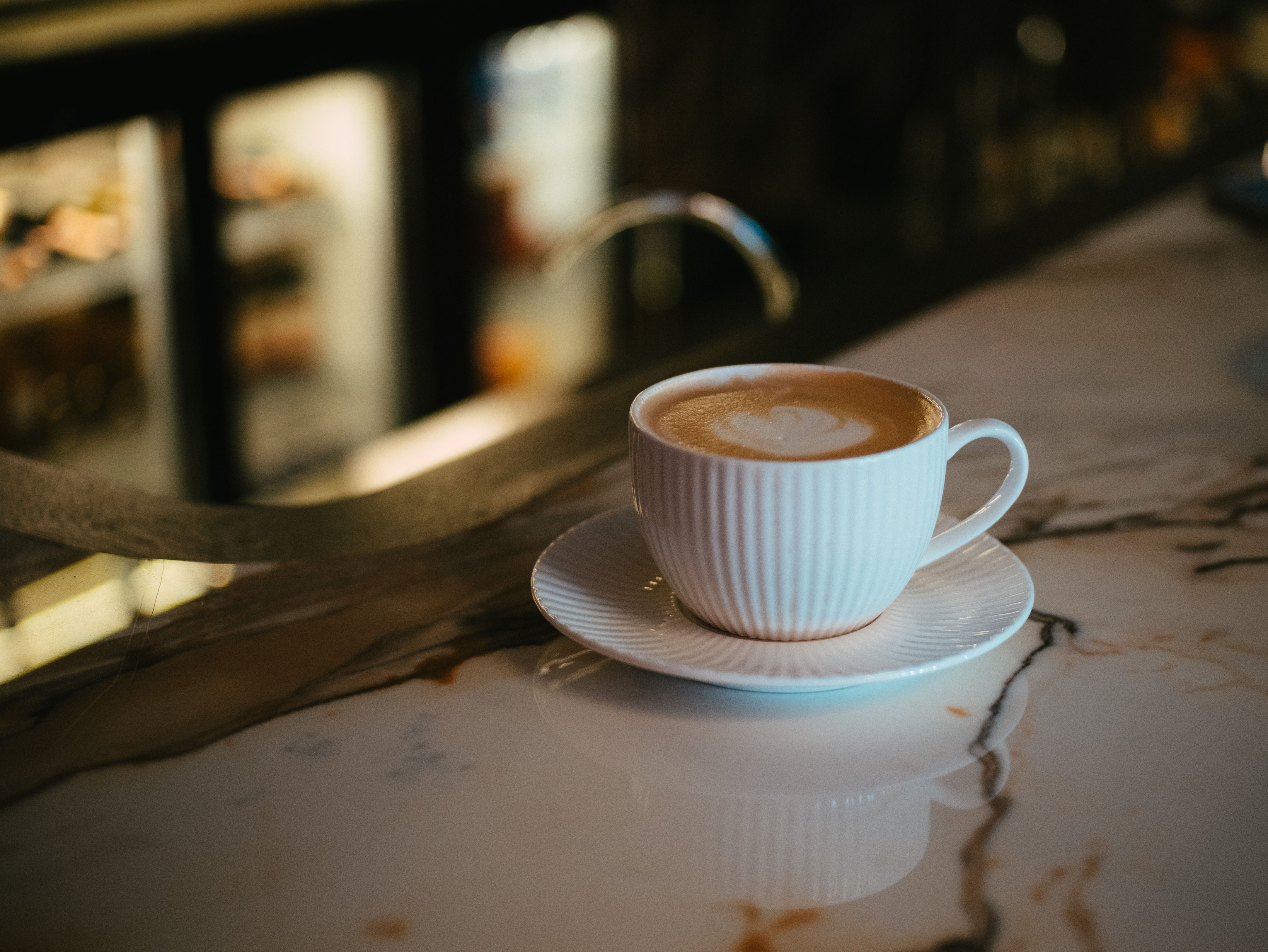 Elegant latte on marble counter