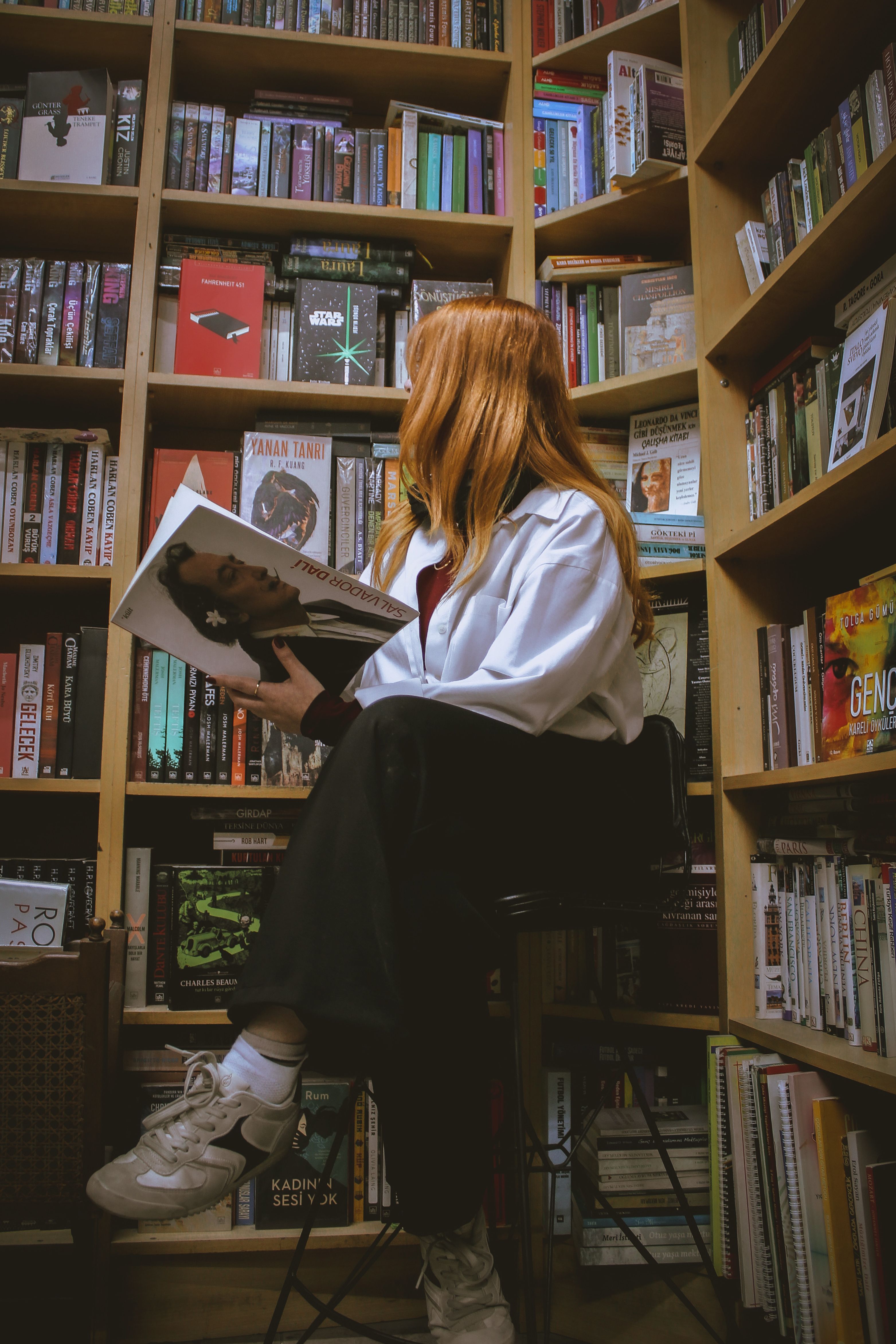 Woman Reading in Cozy Library Setting · Free Stock Photo