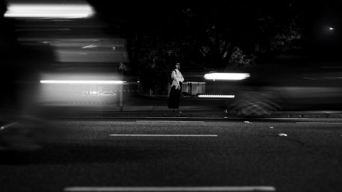 Free Monochromatic night view capturing urban life in motion in Buenos Aires. Stock Photo