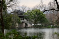 Traditional Chinese Pavilion by Scenic Lake in Hangzhou