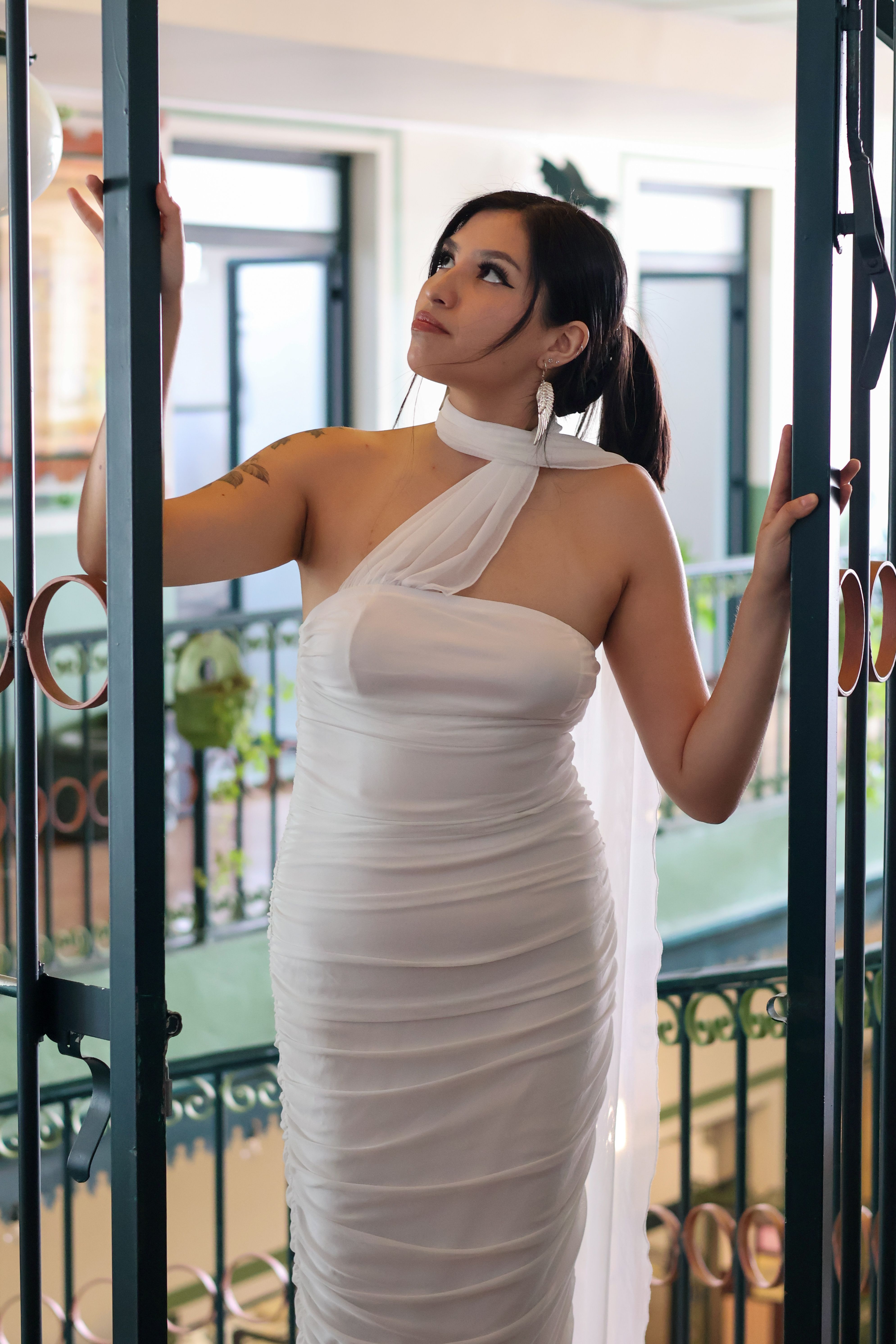 Elegant Woman Posing in White Dress Indoors · Free Stock Photo