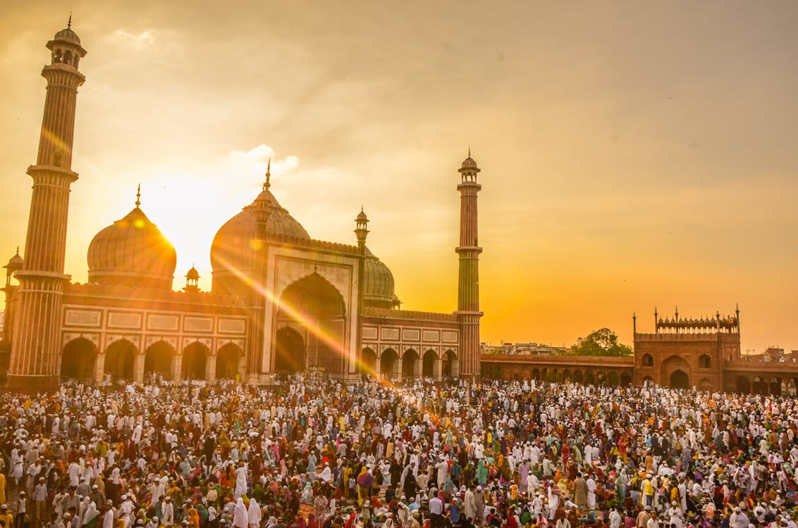 Free Photo Of People In Front Of Mosque During Golden Hour Stock Photo