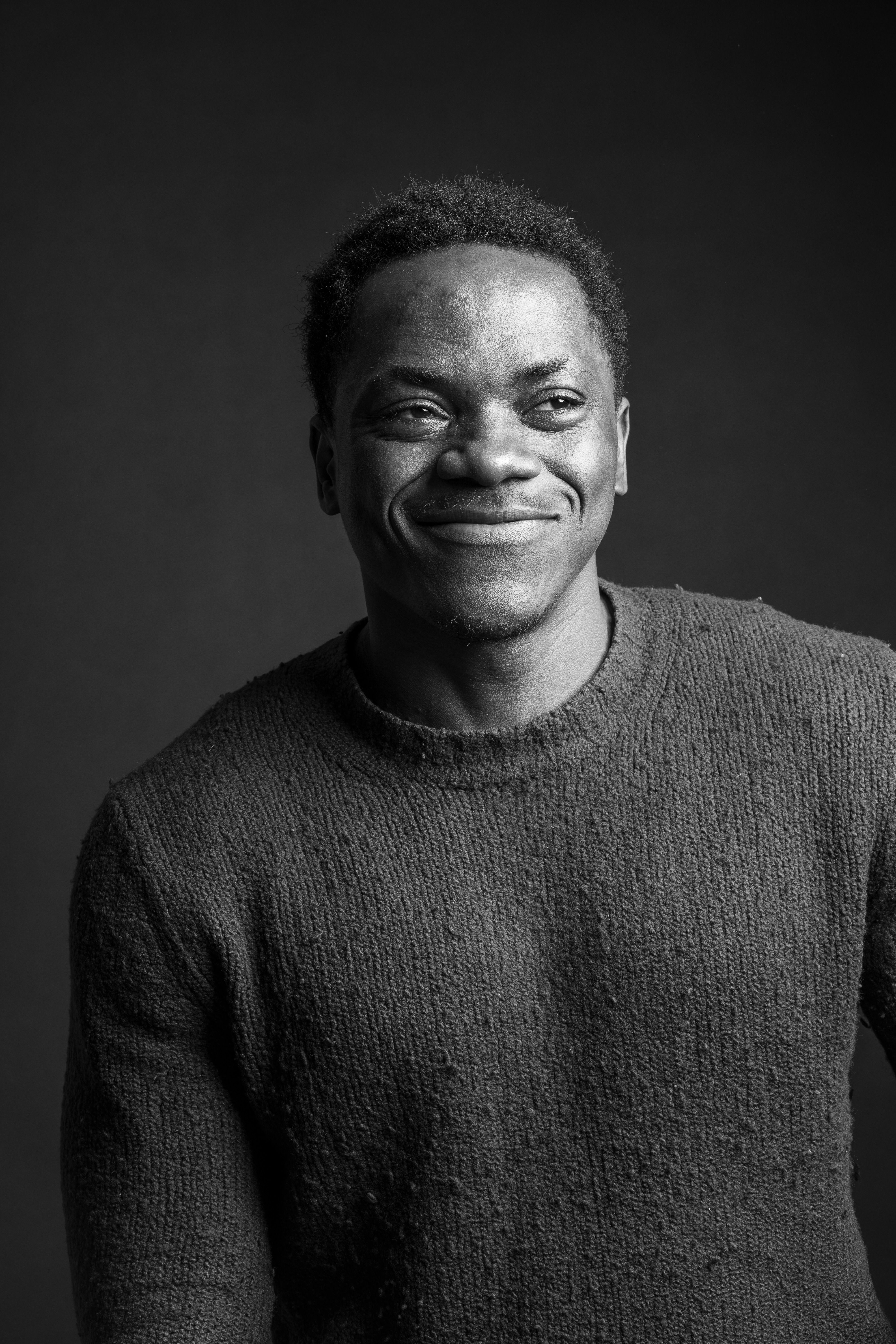 Black and White Portrait of Smiling Man · Free Stock Photo