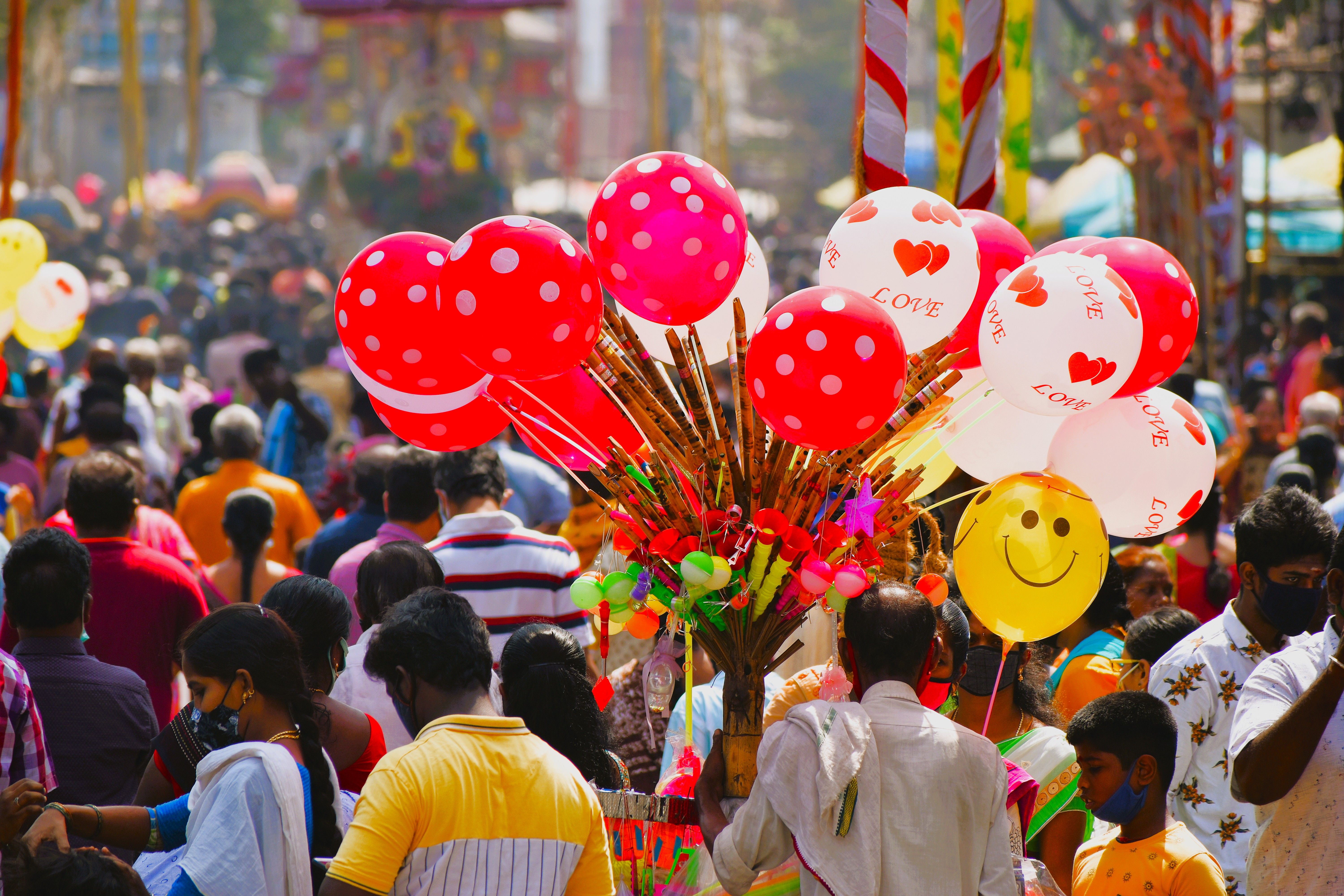 Vibrant Street Festival with Colorful Balloons · Free Stock Photo