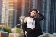 Stylish Woman Posing in Urban Cityscape