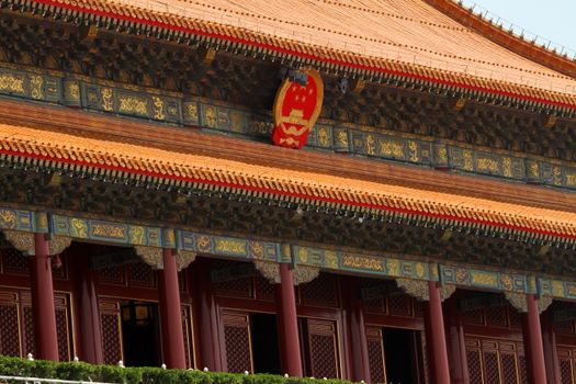 Close-up view of ornate architectural details in Beijing's Forbidden City, showcasing traditional Chinese design elements.