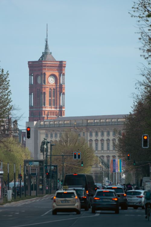 Free View of Rotes Rathaus in Berlin with traffic, showcasing the city's vibrant urban life. Stock Photo