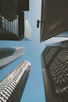 Dynamic low-angle view of modern skyscrapers in Frankfurt am Main, Germany.