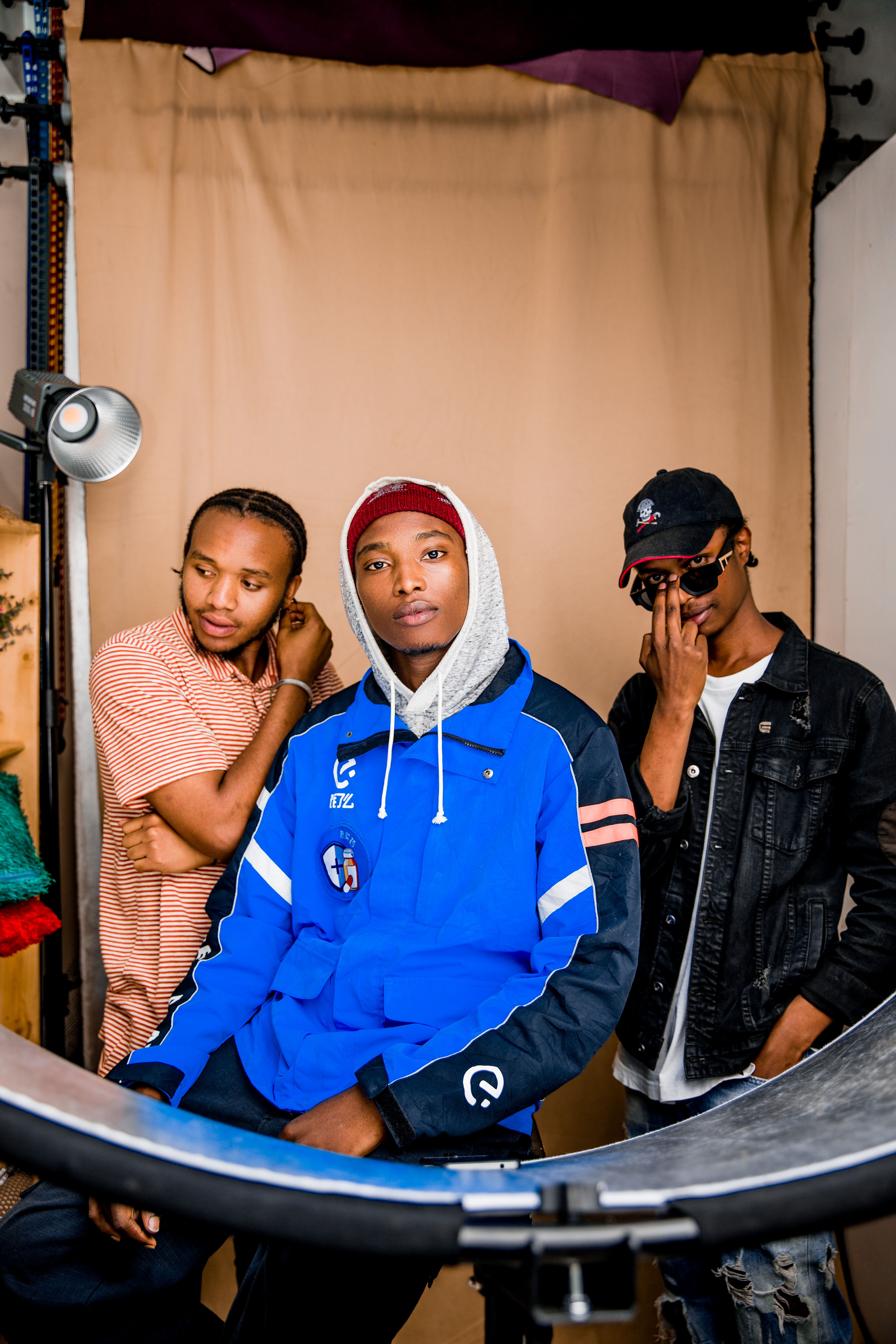 Portrait of Three Fashionable Young Men in Studio · Free Stock Photo