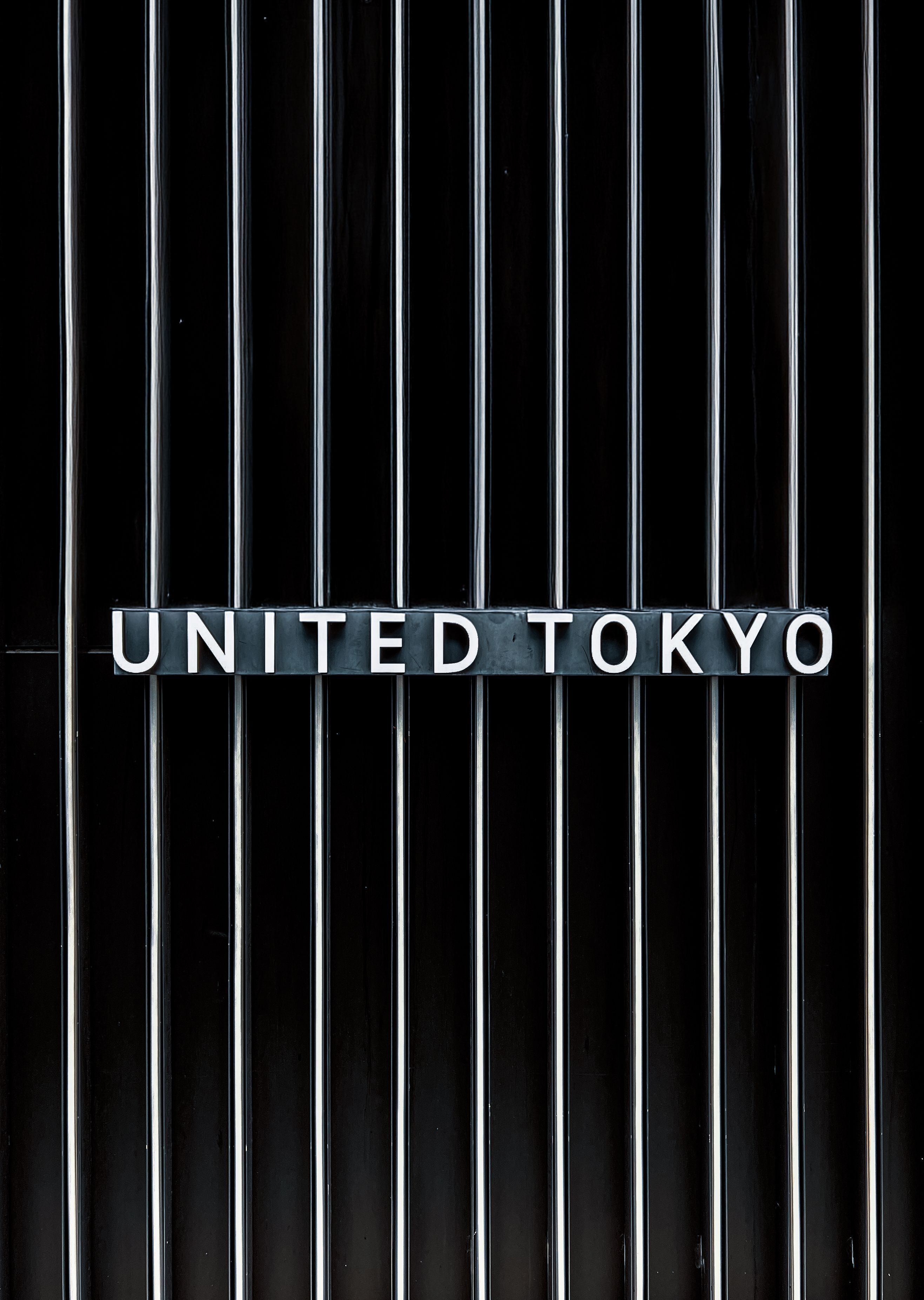 Letrero De United Tokyo En Barras Verticales Modernas · Foto de stock ...