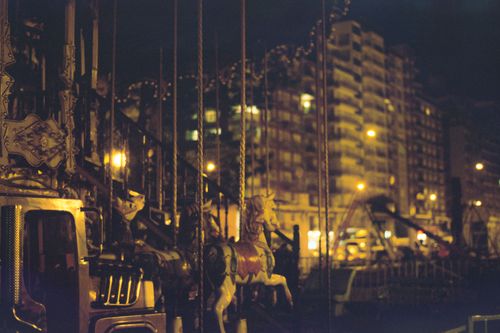 Free A vintage carousel at night in Mar del Plata, capturing urban lights and atmosphere. Stock Photo