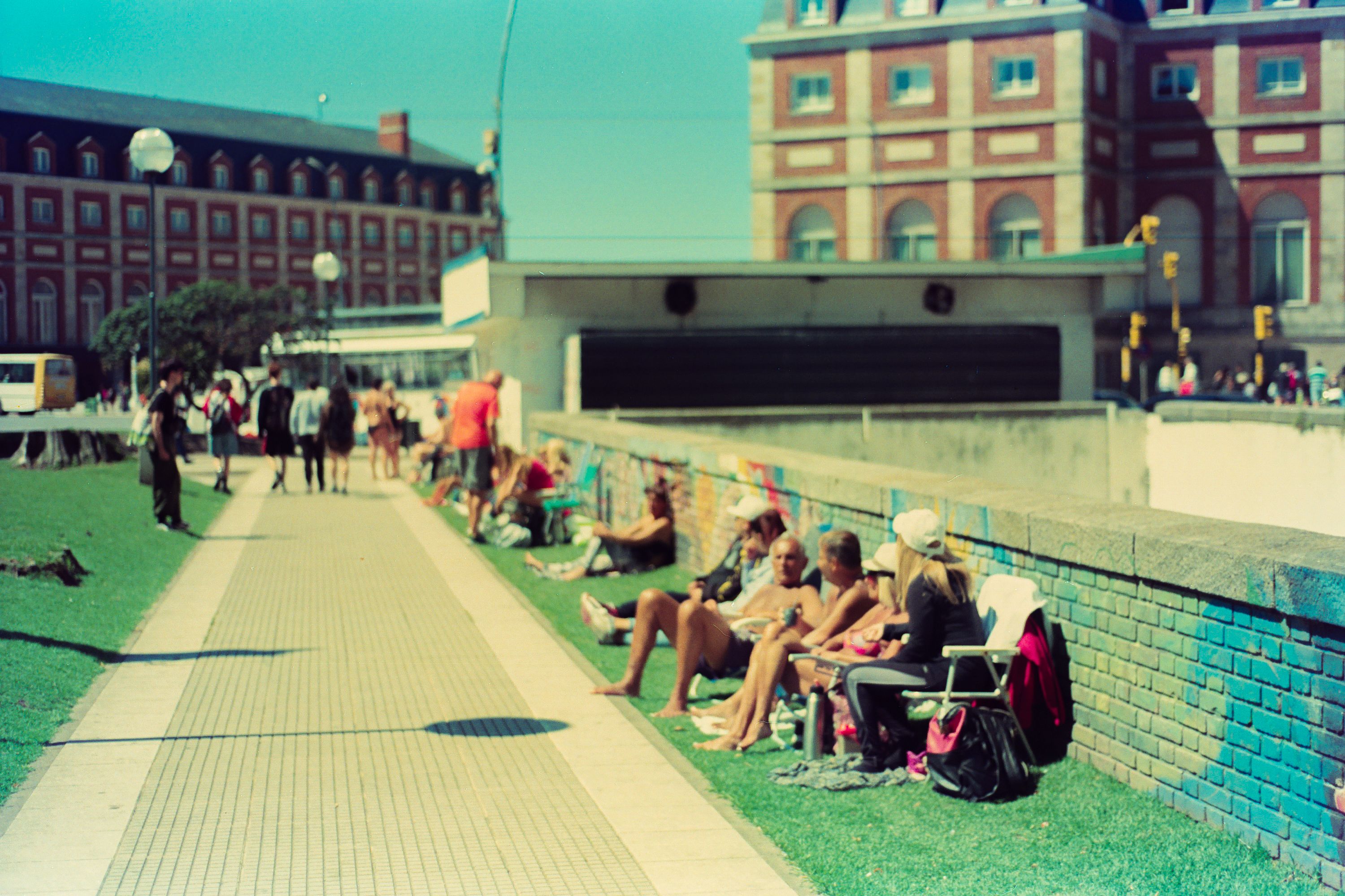 People Relaxing Outdoors in Urban Park · Free Stock Photo
