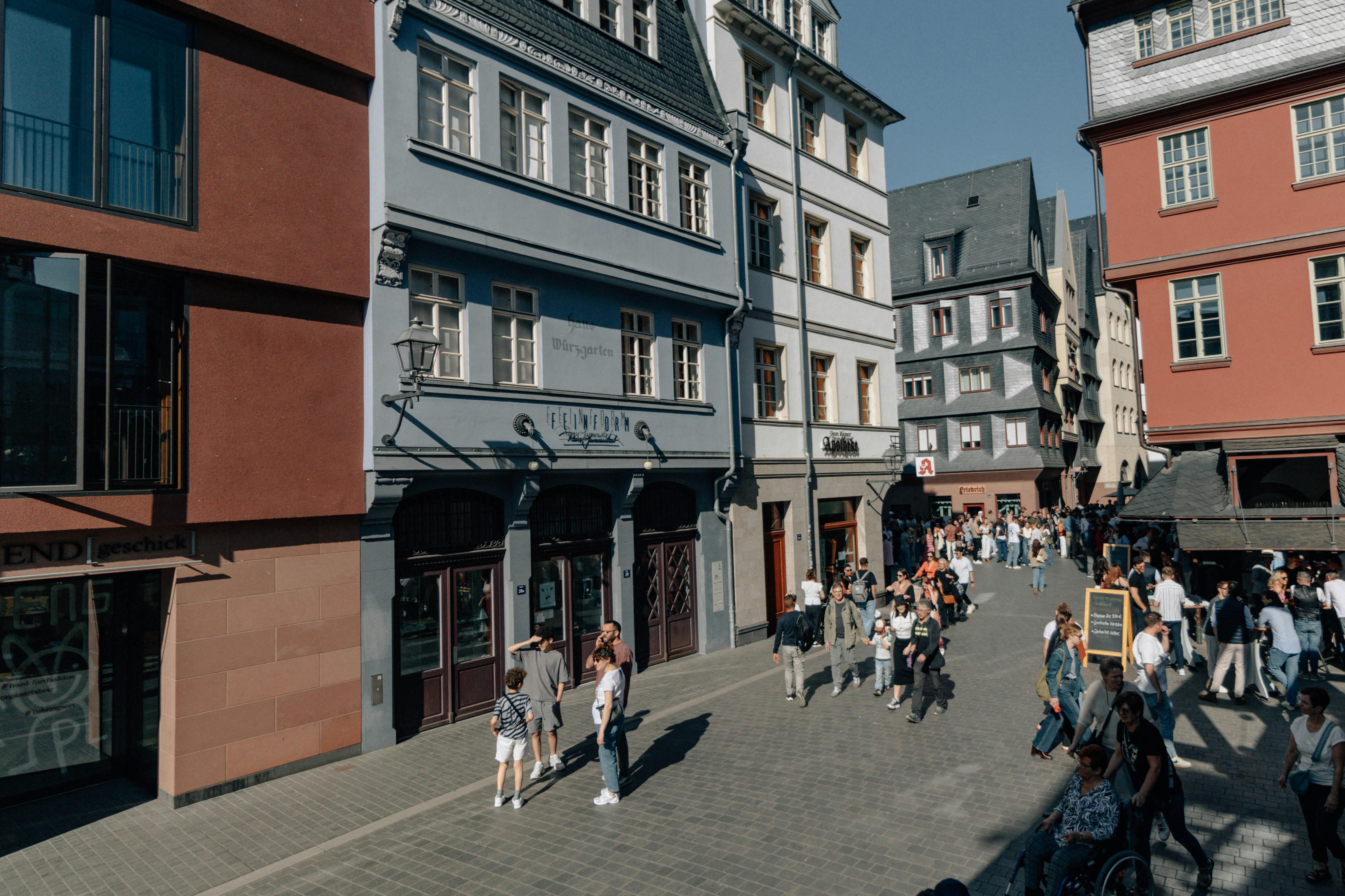 Freelancer collaborating with a team in an office setting