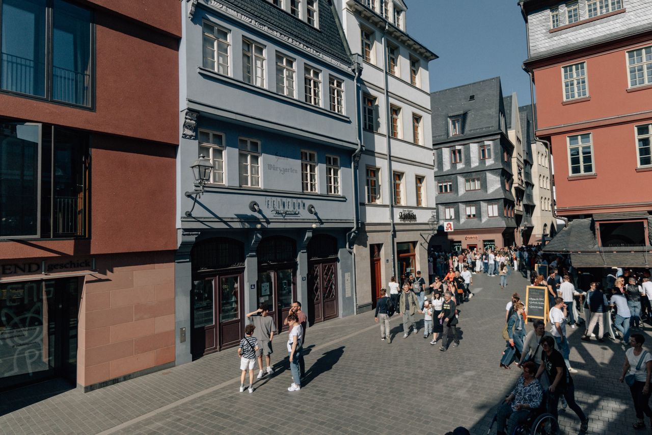 Busy street in Frankfurt's old town with shoppers
