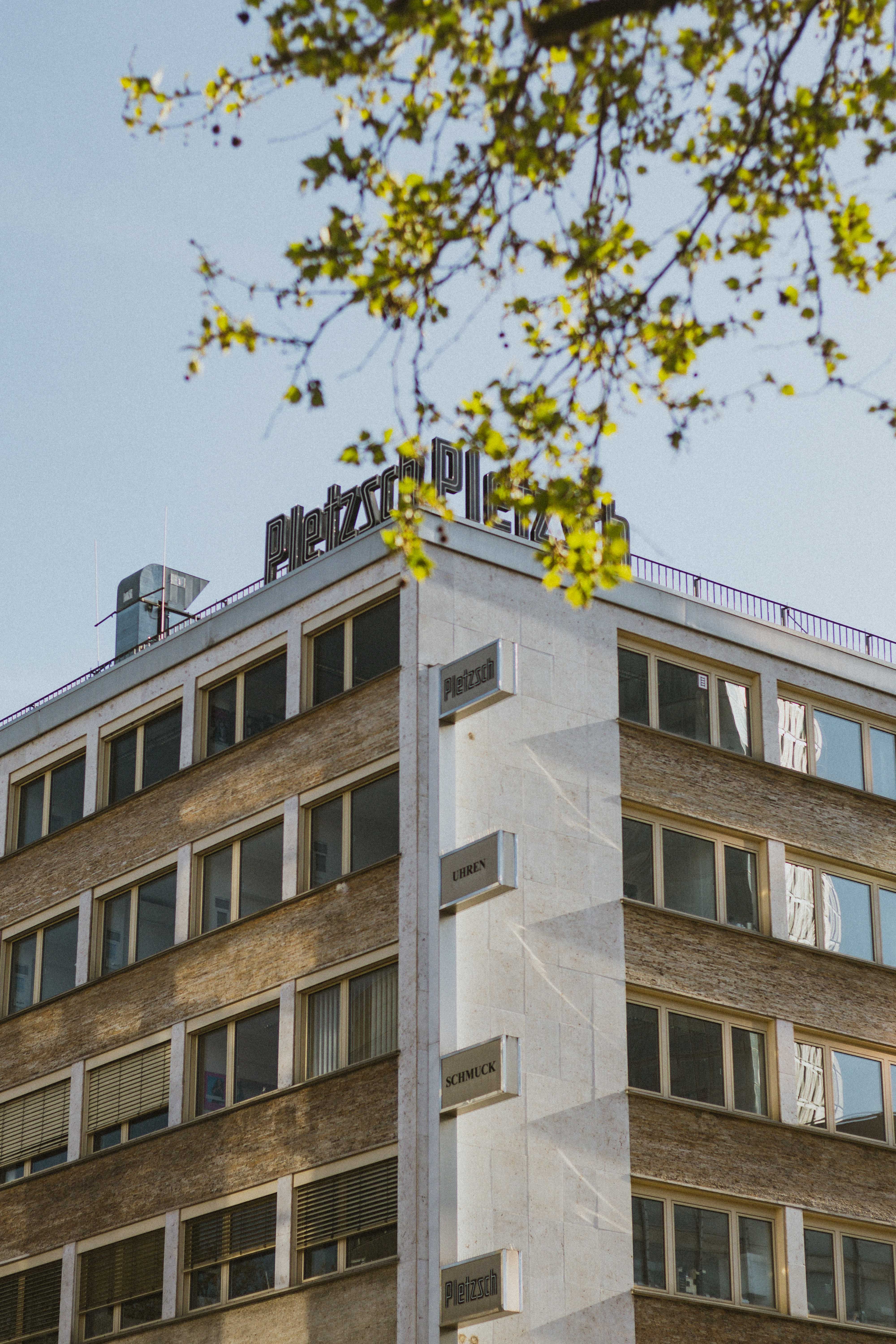 A crisp view of a modern building in Frankfurt, showcasing urban architecture on a sunny day.