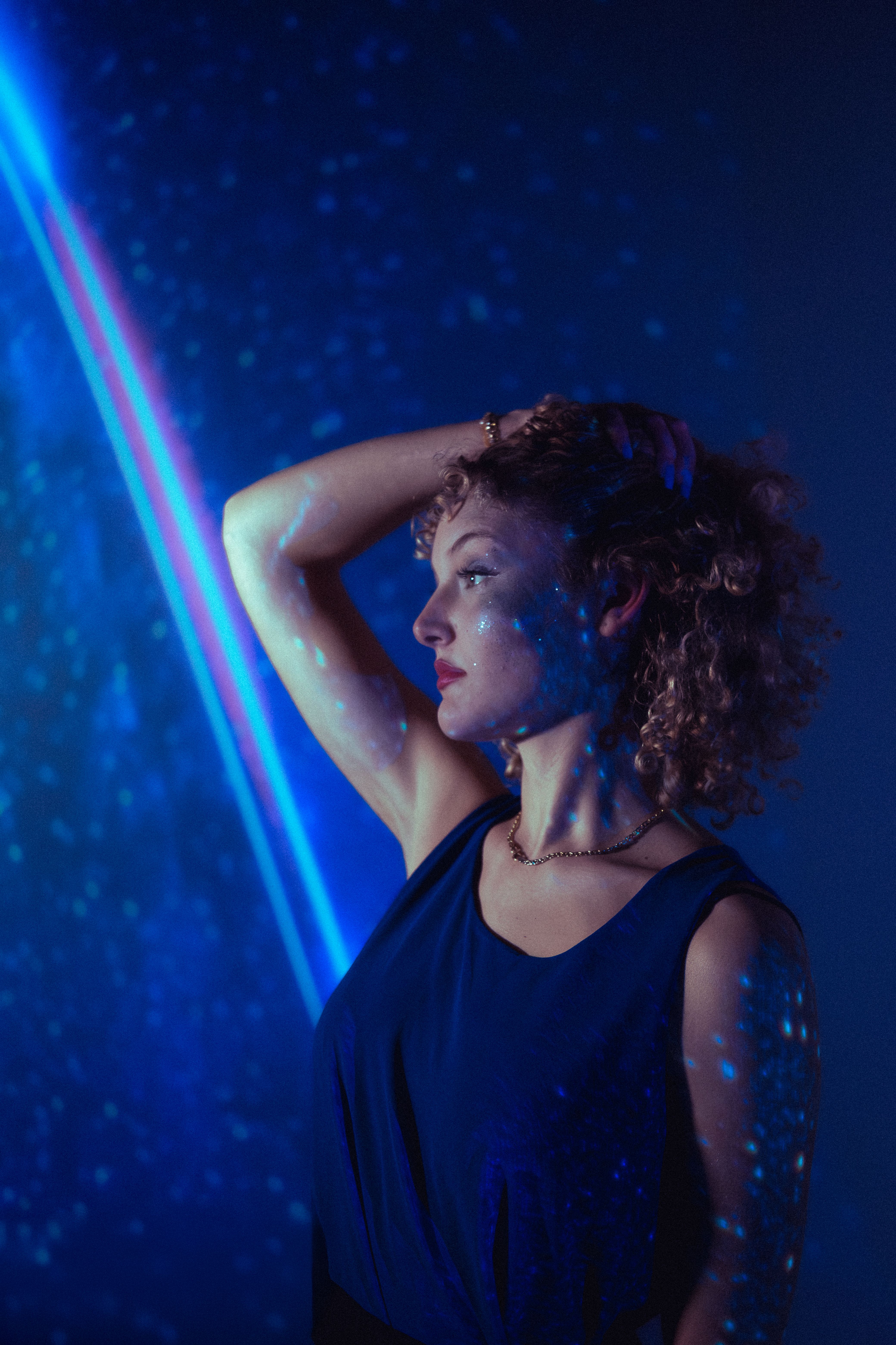 Artistic Studio Portrait with Blue Lighting · Free Stock Photo