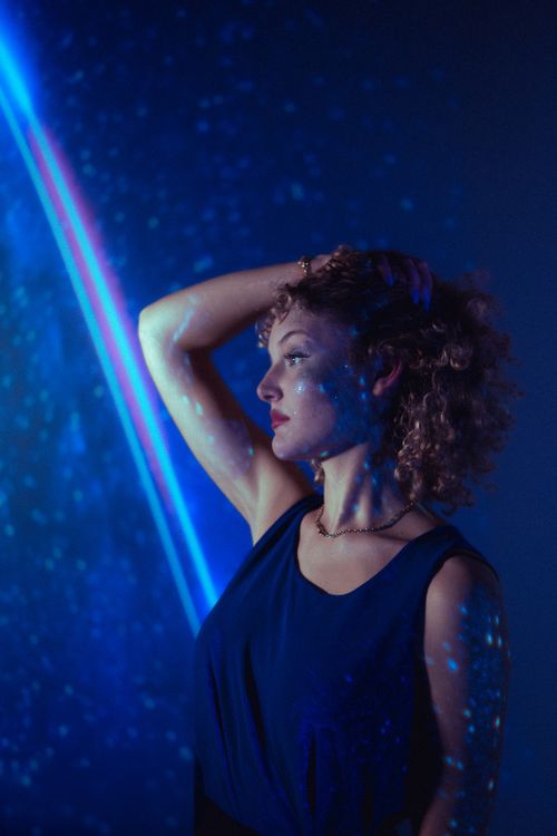Artistic Studio Portrait with Blue Lighting · Free Stock Photo