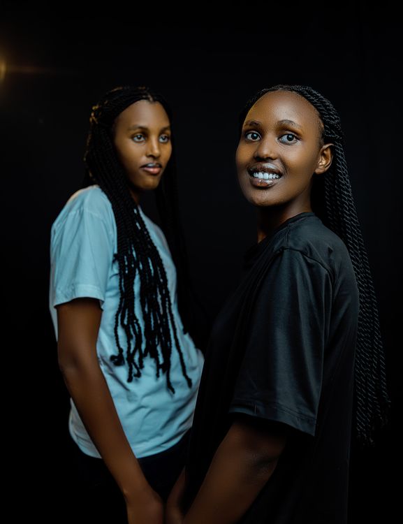 Portrait of Two Smiling Women with Braids · Free Stock Photo