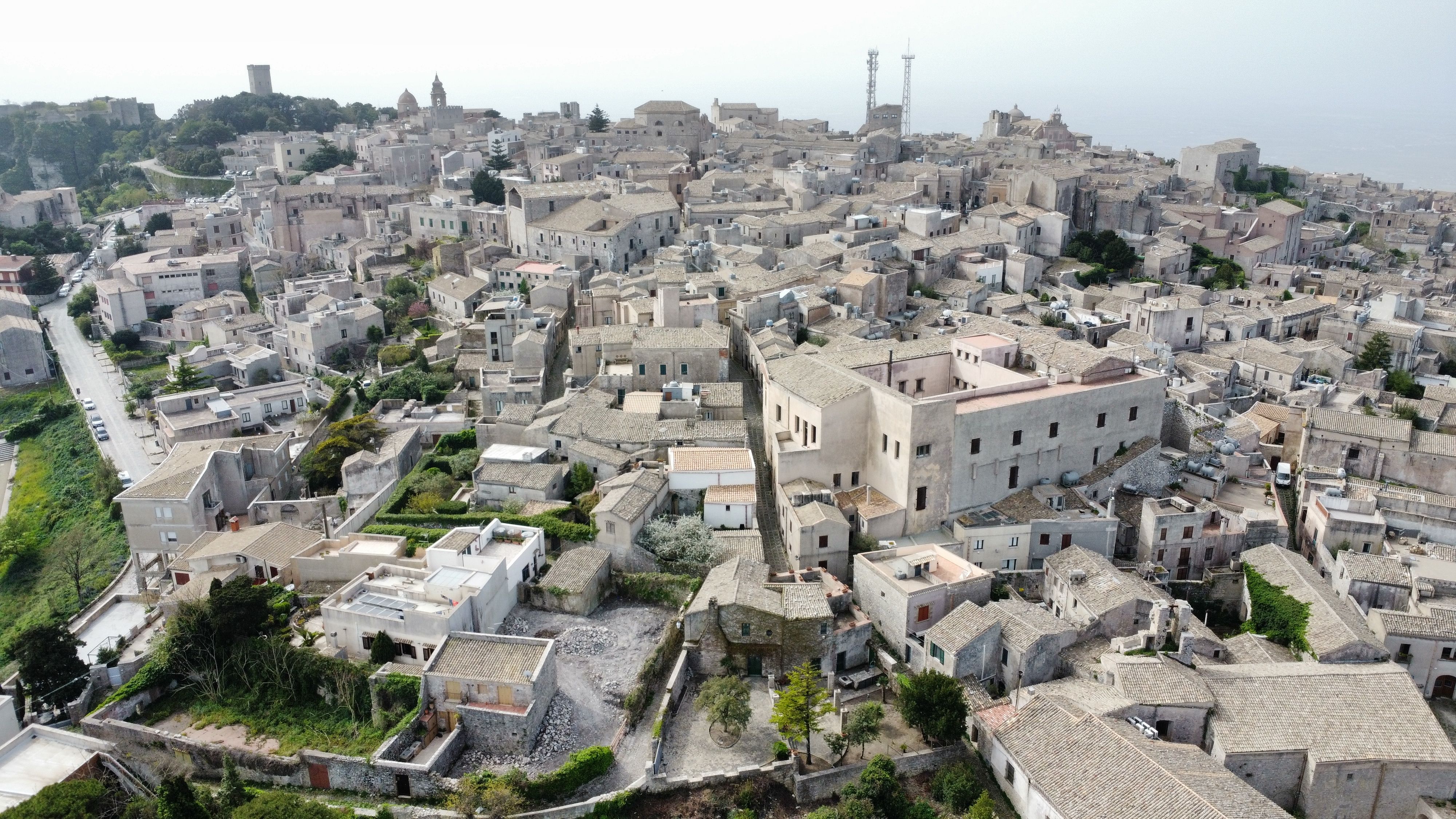 Aerial view of historic Erice, Sicily showcasing traditional stone architecture.