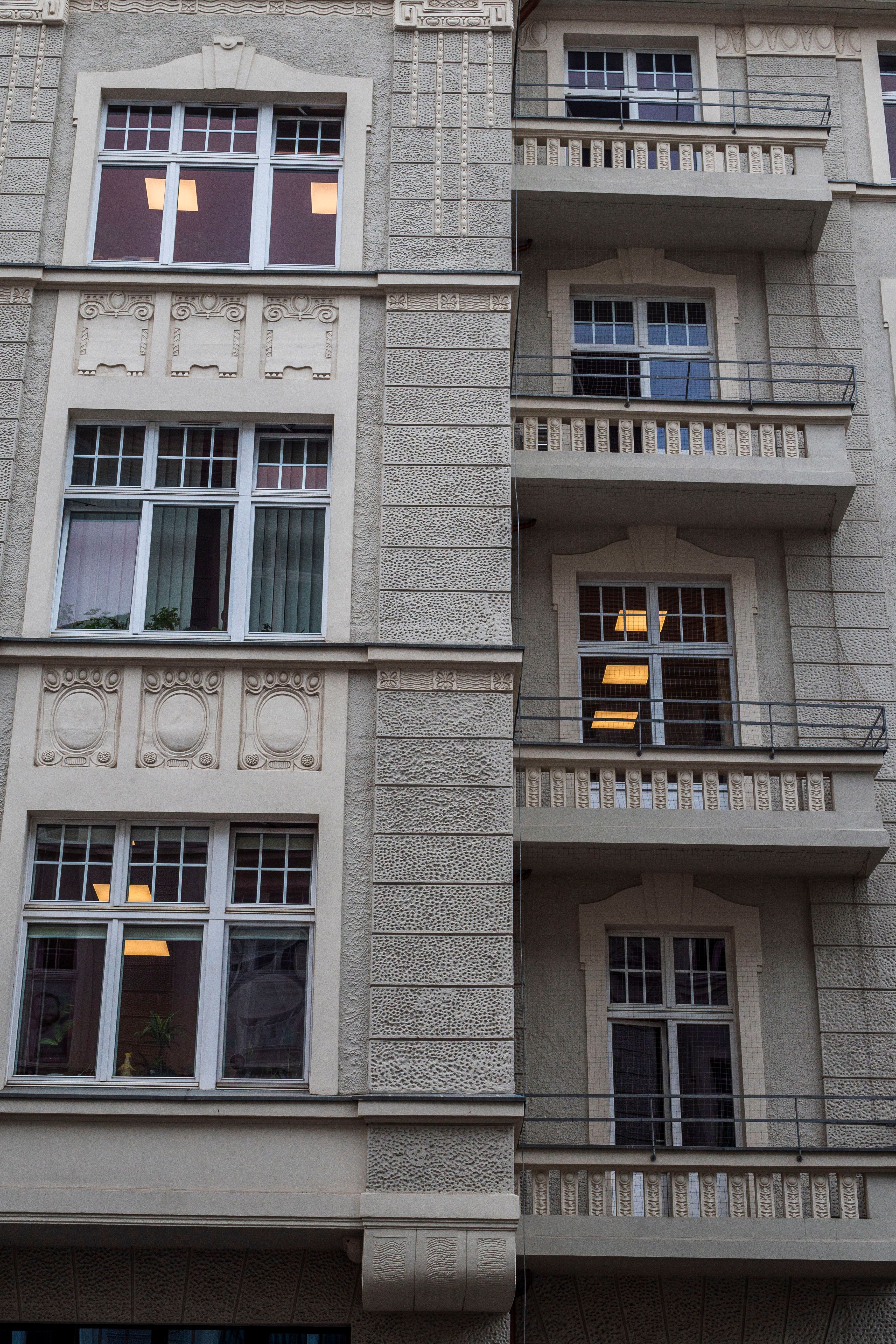 Elegant Residential Building Facade with Balconies · Free Stock Photo