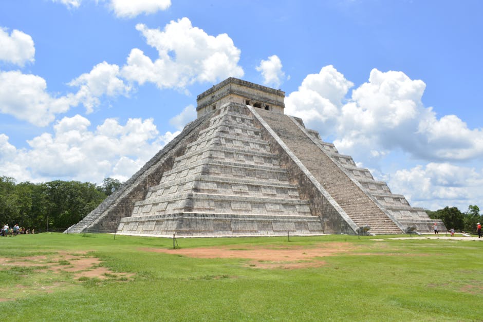 private tours riviera maya itinerary ideas for travel agencies - Explore the iconic Pyramid of Kukulcán in Chichén Itzá with clear skies.
